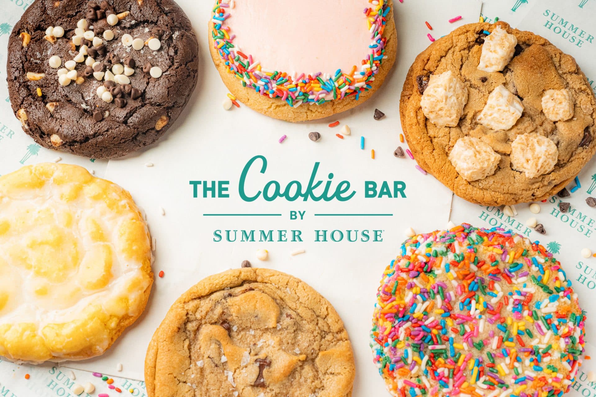 six cookies laid out in a circle with the the cookie bar logo in the middle